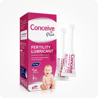 For Conceive Plus Fertility Lubricant Duo Bundle (75ml and 8 Applicators), featuring box of 8x4g pre-filled fertility lubricant applicators with two applicators standing upright beside it, all branded in pink and white with a baby illustration signaling fertility-focused use.
