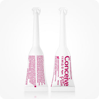 For Conceive Plus Fertility Lubricant Duo Bundle (75ml and 8 Applicators), close-up of two 4g pre-filled fertility lubricant applicators standing upright, one showing front label and other, back with usage directions, both designed for direct vaginal application to support conception.