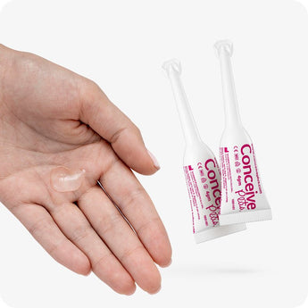 For Conceive Plus Fertility Lubricant Duo Bundle (75ml and 8 Applicators), featuring two 4g pre-filled fertility lubricant applicators beside an open hand with a clear gel sample, highlighting product consistency and easy, mess-free application for fertility support.