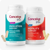 For Conceive Plus Motility and Ovulation Support Bundle showing two labeled supplement bottles—one in teal for women's ovulation support and one in red for men’s motility support—each with bold branding and visible capsules scattered near the base, photographed against a white background to emphasize packaging and gender-specific formulation.