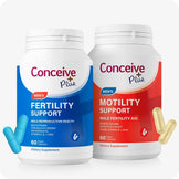 Conceive Plus Motility Booster Bundle featuring two supplement bottles—Men's Fertility Support in blue packaging and Men's Motility Support in red—shown upright on white background, with matching capsules placed in foreground to highlight color and form for visual clarity.