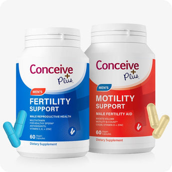 Conceive Plus Motility Booster Bundle featuring two supplement bottles—Men's Fertility Support in blue packaging and Men's Motility Support in red—shown upright on white background, with matching capsules placed in foreground to highlight color and form for visual clarity.