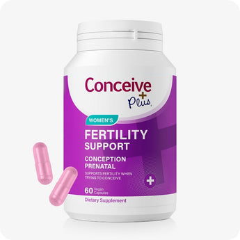 For Conceive Plus Women's Fertility Support and Ovulation Support Bundle, supplement bottle in rich purple packaging labeled “Women's Fertility Support,” with two pink vegan capsules placed in front—designed to assist fertility when trying to conceive, displayed on white background.